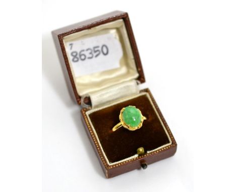 A gold hardstone set ring, stamped 18KFinger size R, 3.71g gross