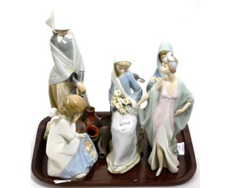Lladro figure of a penguin and five figures 