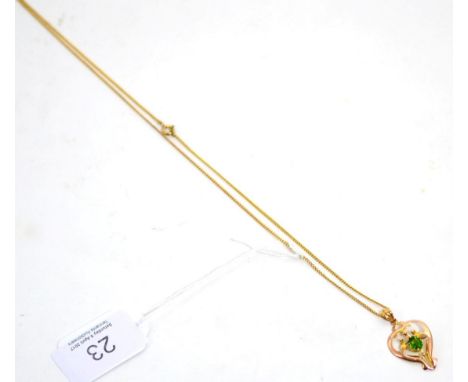 An Art Nouveau green doublet necklace on chain stamped 9ct, 4.11g gross