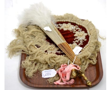 Mother of pearl fan with cream silk mount and white down feather trim; pair of 19th century face screens, with red velvet mou
