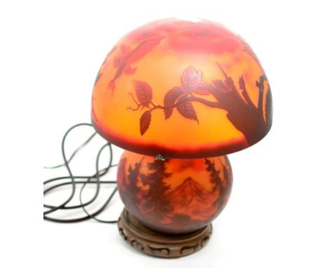 A Galle style table lamp, made in China, imported by J.J Vaillant Ltd, the shade decorated with owls, the base with a mountai