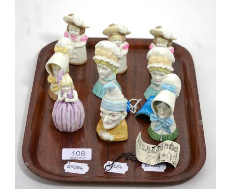 Nine 1970's Royal Worcester candle snuffers, including Feathered Hat (3) Mop Cap (2) Young Girl, Old Woman, Punch and Hush