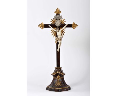 Crucified Christ, partially painted and gilt ivory sculpture, Brazilian rosewood base and cross with gilt carvings and silver