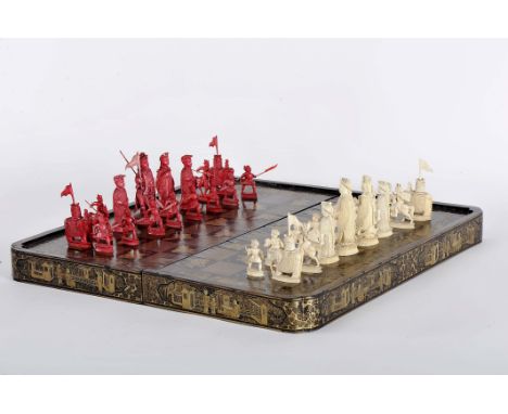 Chess pieces and a chess and backgammon board closing in a box shape, carved ivory "Emperors and empresses of China and other