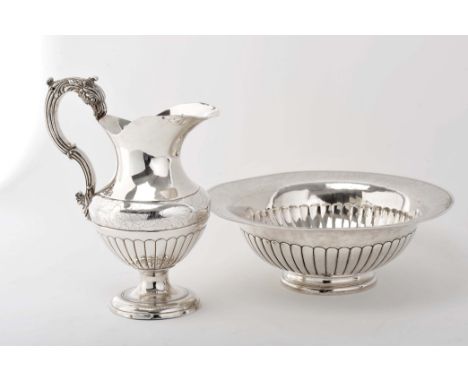 A pitcher and basin, 833/1000 silver, gadrooned decoration with engraved band "Flowers", vase with handle en relief "Bird's h