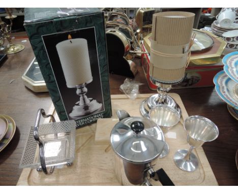 A plated candlestick, water jug and goblets etc