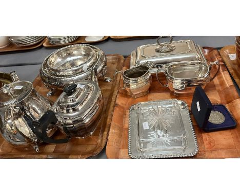 Two trays of silver plate to include: teapots, milk jug, sugar bowl, City of Belfast coin in case, Mappin & Webb three footed