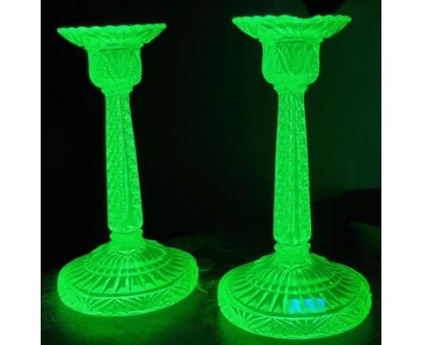 Pair of uranium glass moulded candlesticks together with a blue glass mallet shaped decanter and stopper. (3) (B.P. 21% + VAT