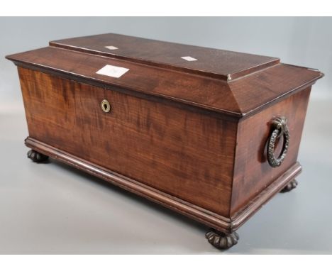 19th century mahogany sarcophagus shaped tea caddy, the interior revealing two sections with ceramic mixing bowl raised on fl
