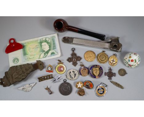 Plastic tub of assorted medals and enamel badges, ACME Shepherds Lip Whistle, large cigar cutter, HMS Victory brass door knoc