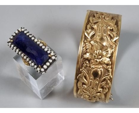 Silver gilt Georgian style dress ring together with an ornate gold plated relief floral and foliate decorated bangle.  (2)   