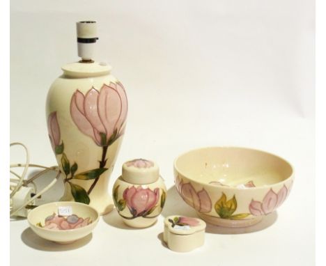 A quantity of modern Moorcroft, cream ground with pink peonies, comprising a table lamp of baluster form, a fruit bowl, a pin