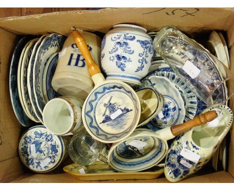 Large quantity Dutch delft blue and white ware to include dishes, wall plates, trinket dishes, tiles, model clogs, lidded vas