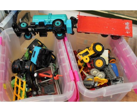Two boxes of model and toy farm vehicles