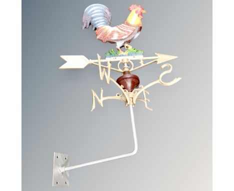 A cast iron cockerel weather vane.