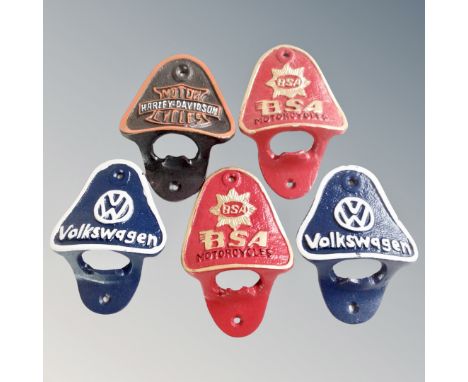 Five cast iron bar bottle openers, Harley Davidson, BSA and Volkswagen.