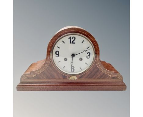 An Edwardian inlaid mahogany eight day mantel clock.