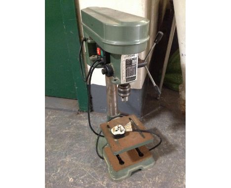 A Nu-Tool five-speed drill press.