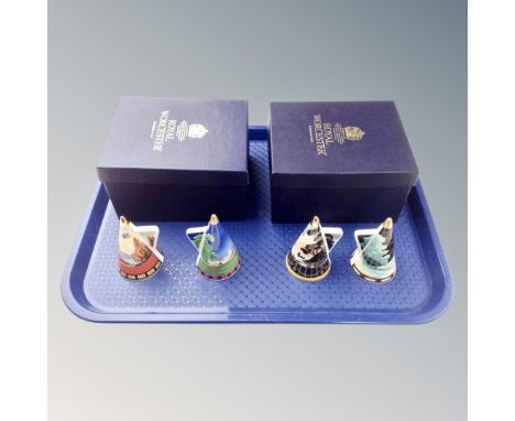 A set of four Royal Worcester Art Deco ceramic candle snuffers in two boxes.