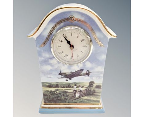 A Bradex Heroes of the Sky heirloom porcelain mantel clock. (height 20cm)