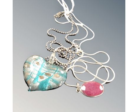 A Murano glass heart pendant on marked beaded silver together with a sterling silver snake chain holding faceted lavender sto