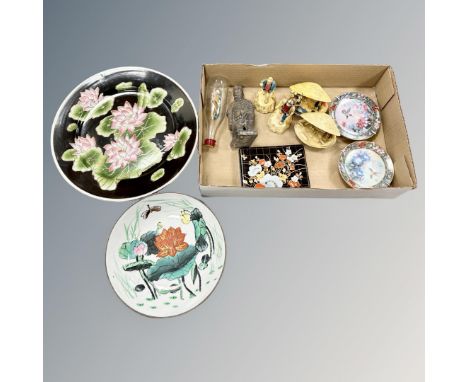 Two oriental plates and a box containing similar figures, compact etc