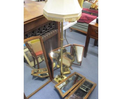 A brass mirror, a standard lamp and shade, together with a 1930s triple dressing mirror and companion 