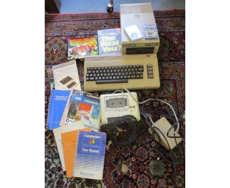 A retro Commodore 64 console and accessories, a metal detector and other items 