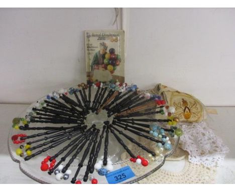 A quantity of beaded bobbins, crochet work, a silk panel A/F and a 1988 Royal Doulton Old Balloon Seller novelty pack, togeth