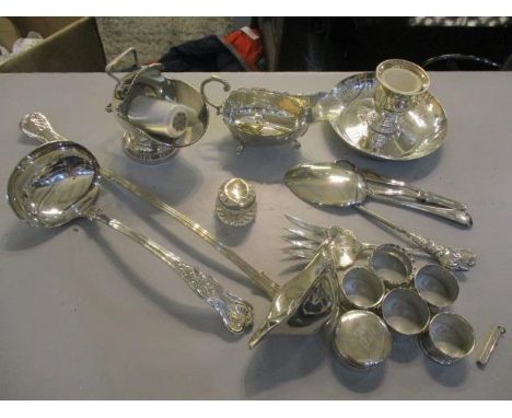 Mixed silver and silver plate to include a silver plated serving ladle, silver napkin rings and other items 