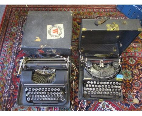 A vintage Remington portable compact typewriter and two others 