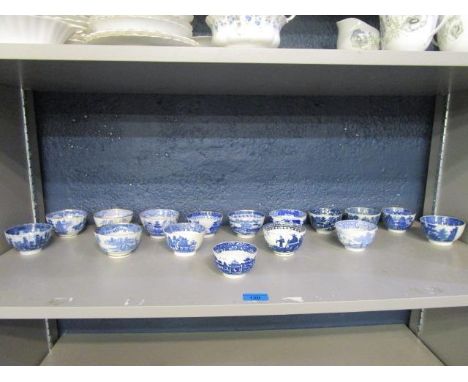 A collection of late 18th century and early 19th century blue and white tea bowls to include a Caughley Salopian china bowl d