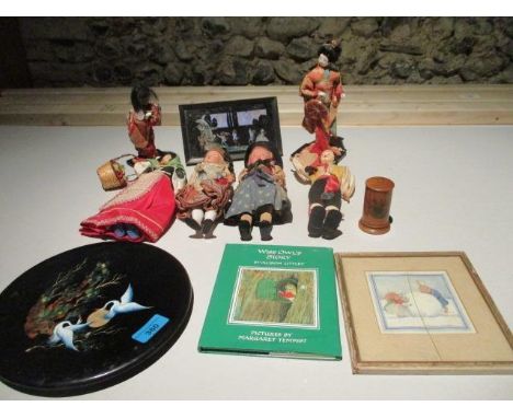 Six vintage fabric dolls of the world, a small butterfly wing pictures, a Chinese lacquered shallow dish, a treen needle box,