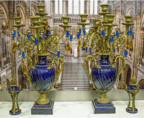 CANDELABRA, a pair, of substantial proportions, each with five gilt metal sconces and blue ceramic bodies, 85cm H x 50cm W an