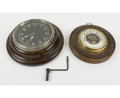 WALL CLOCK AND AN ANEROID BAROMETER, the timepiece with luminous numbers and inscribed 'Wycombe Motor Bodies Ltd.' 16cm diam.