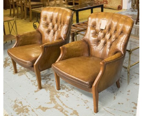 ARMCHAIRS, a pair, vintage faded tan brown buttoned leather each with cushion by Parker Knoll. (2)