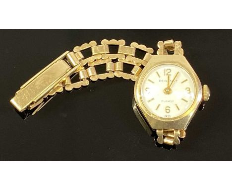 REGENCY 9CT GOLD LADY'S BRACELET WATCH, circular dial with baton hour markers and numerals at quarter hours, manual wind, 15.
