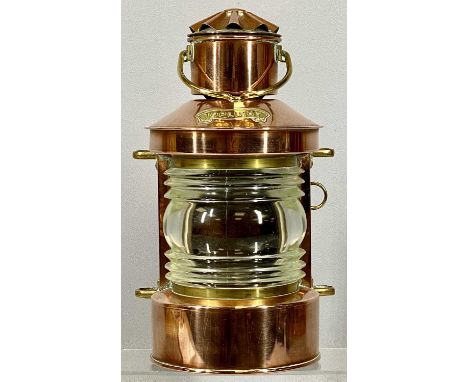 SHIP'S COPPER TOP LIGHT with brass mounts and swing handle, with burner, 32cms (h)Provenance: private collection Denbighshire