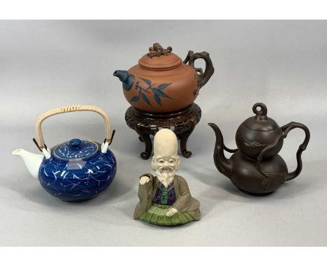 MIXED GROUP OF ORIENTAL CERAMICS including a terracotta teapot, decorated in relief with flowers and leaves and with branch d