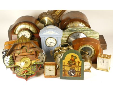 A collection of mid 20th century and later mantel clocks, anniversary clocks, carriage clocks, and barometers, having manual 