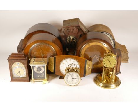 A collection of mid 20th century and later mantel clocks, miniature novelty clocks, traveling alarm clocks and carriage clock