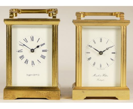 A 20th century Mappin &amp; Webb brass and four glass corniche carriage clock, with white dial and black Roman numerals, rais