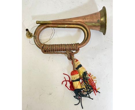A 20th century copper and brass bugle, 29cm long 