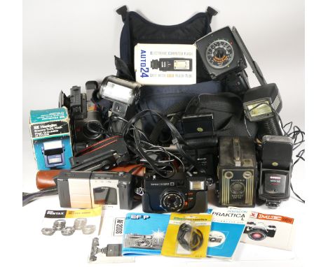 Assortment of camera accessories and lighting equipment 