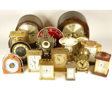 A collection of mid 20th century and later mantel clocks, anniversary clocks and carriage clocks, having manual wind and quar