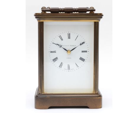 A 20th century Matthew Norman brass corniche cased mantle striking carriage clock, with repeater button, the white dial with 