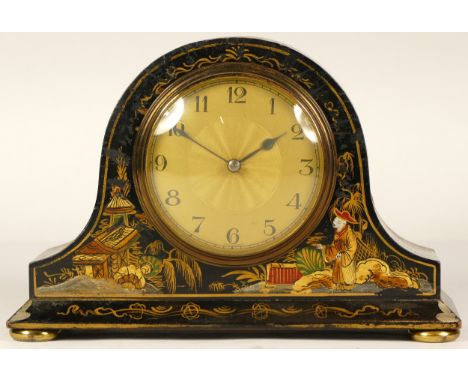 An Edwardian black lacquer chinoiserie mantel clock, painted with figures in landscapes, housing an eight day French movement