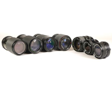 Seven assorted camera lenses comprising Hoya HMC Wide-Auto f=28mm 1:2.8, Miranda 35-70mm 1:3.5-4.5 MC Macro, RMC Tokins 80-20