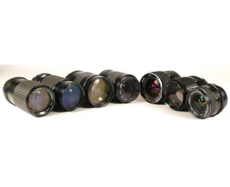 Seven assorted camera lenses comprising Chinon 1:3.3 f=200mm, Tamron 28-70mm 1:3.5-4.5 CF Macro, Hoya 52mm Skylight Sigma Zoo
