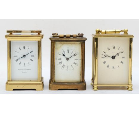 A 20th century Matthew Norman brass and four glass corniche cased carriage clock, the white dial with black Roman numerals, r